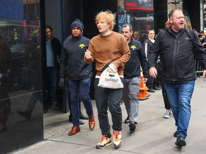 Ed walking along the street