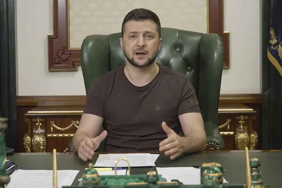 In this image from video provided by the Ukrainian Presidential Press Office, Ukrainian President Volodymyr Zelenskyy speaks from Kyiv, Ukraine, early Sunday, March 20, 2022. (Ukrainian Presidential Press Office via AP)