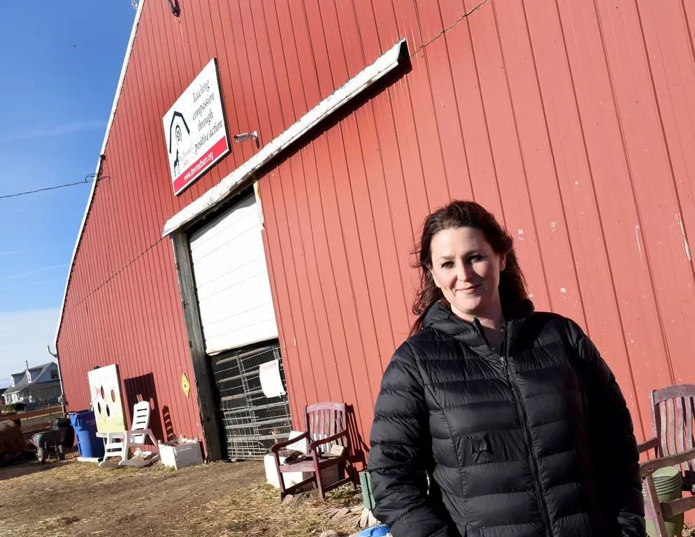 Melissa Borden, founder of The Devoted Barn, is pictured at a facility in Frenchtown Township.