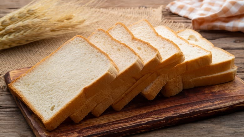 Sandwich bread on wooden board