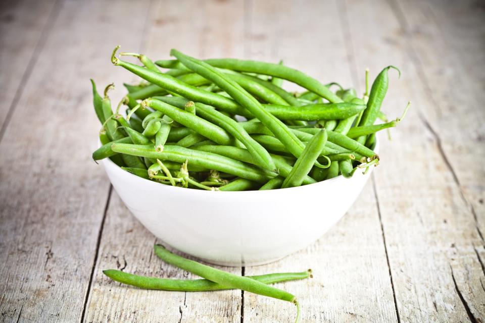 Green beans and other vegetables can be purchased four or five days before Thanksgiving; they'll keep if properly dried and stored.