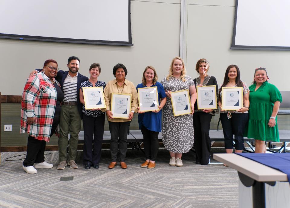 A group of local educators receives Remarkable Teacher Awards at the Leaders Readers Network Teacher Appreciation Event on May 9 in Amarillo.