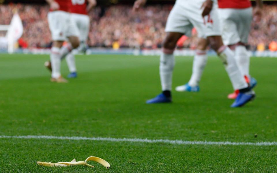 A banana skin was thrown onto the pitch, towards Pierre-Emerick Aubameyang, during Sunday's north London derby - AFP