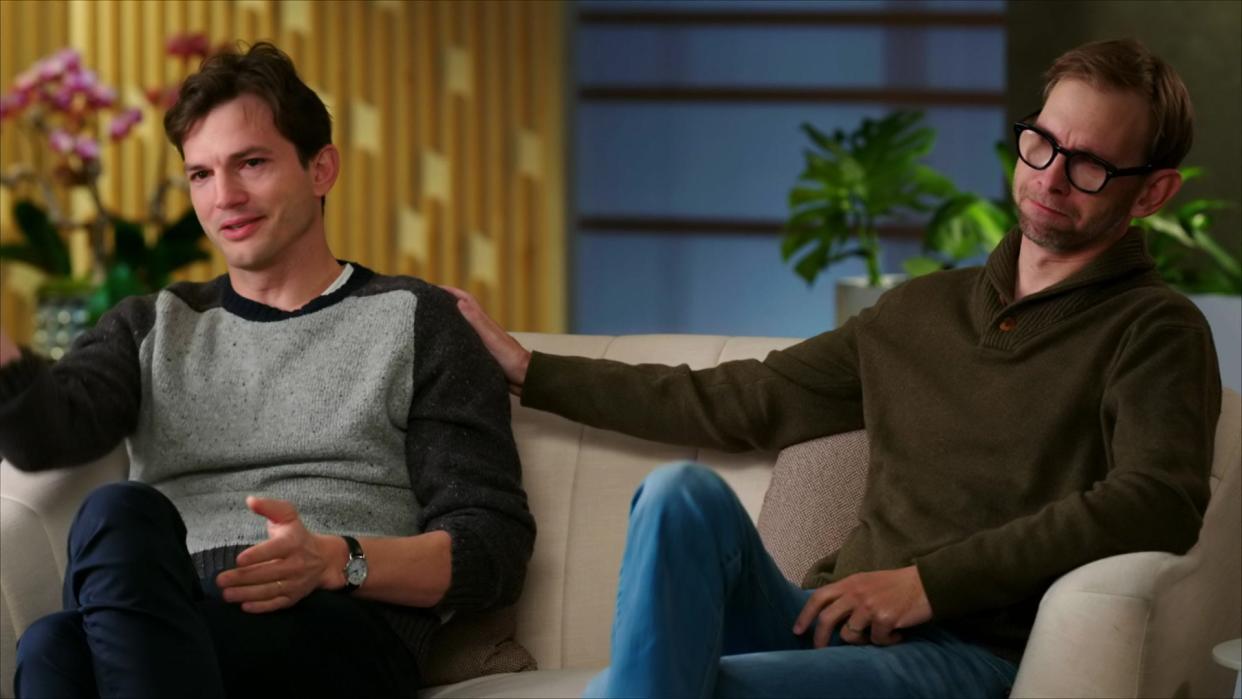 Ashton Kutcher, left, sits for an interview with his twin brother, Michael, right.