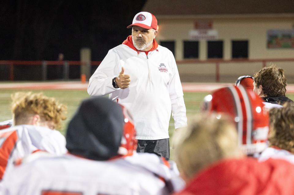 Canton South football coach Matt Dennison talks to his team following a loss to Glenville in the state semifinals, Friday, Nov. 24, 2023, in Wadsworth.