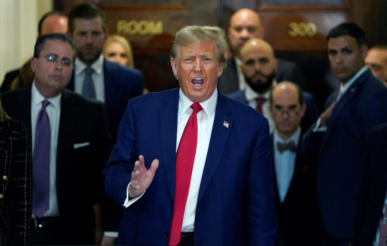 Former President Donald Trump speaks to the press as he departs the New York State Supreme Court during the civil fraud trial against the Trump Organization in New York City on Jan. 11.