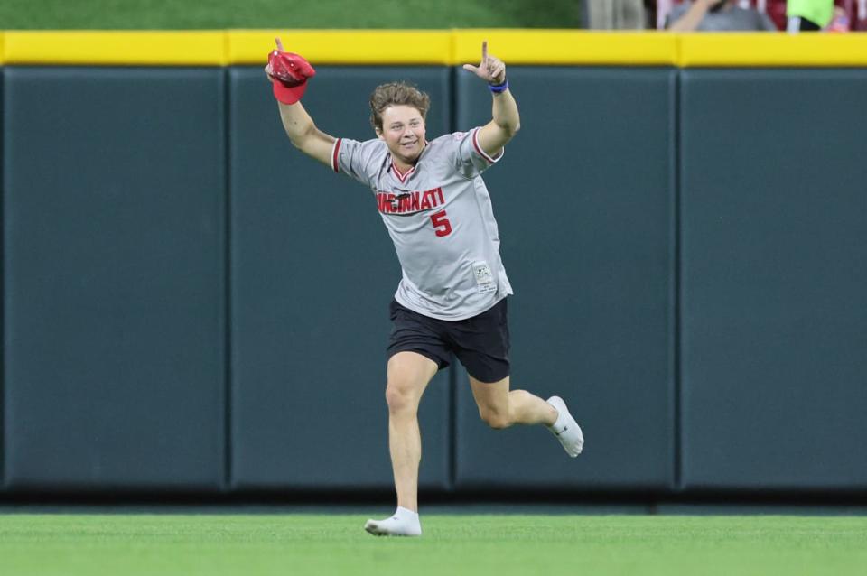 William Hendon runs on the field before the ninth inning of the Cincinnati Reds against Cleveland Guardians at Great American Ball Park.