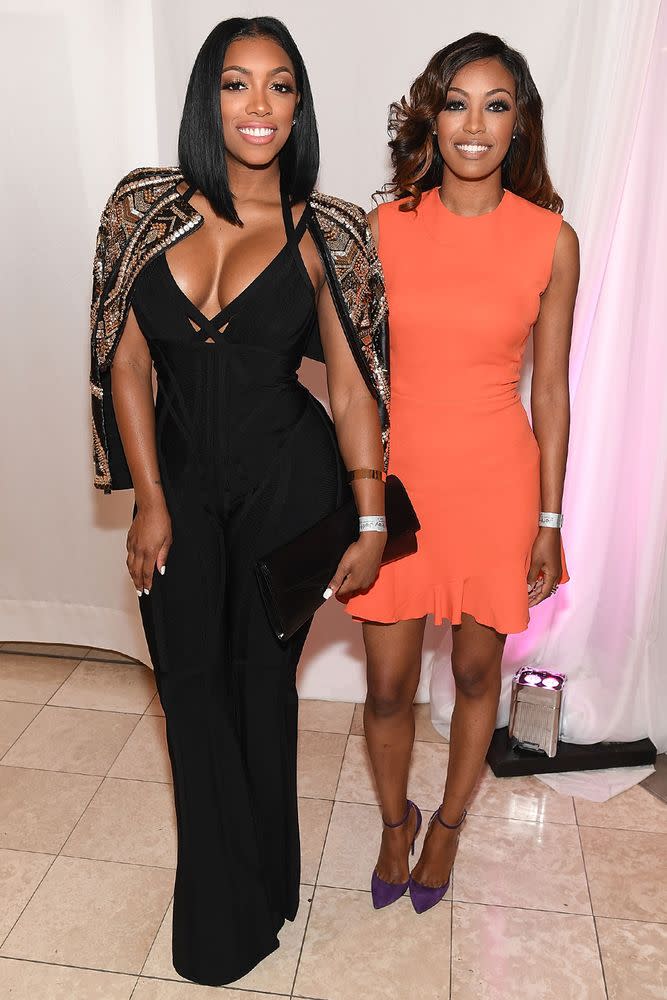 Porsha Williams (left) and her sister Lauren | Paras Griffin/Getty