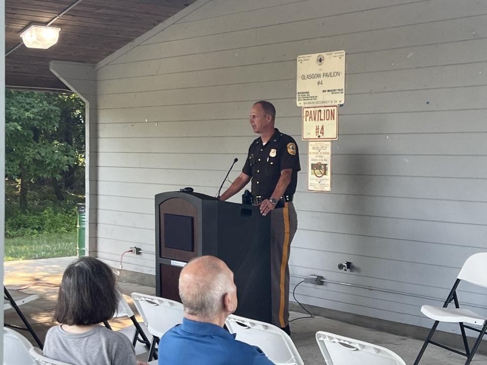 New Castle County chief of police Joseph Bloch speaks to a large group of citizens at Glasgow Park Thursday, July 13 concerning a recent string of incidents.
