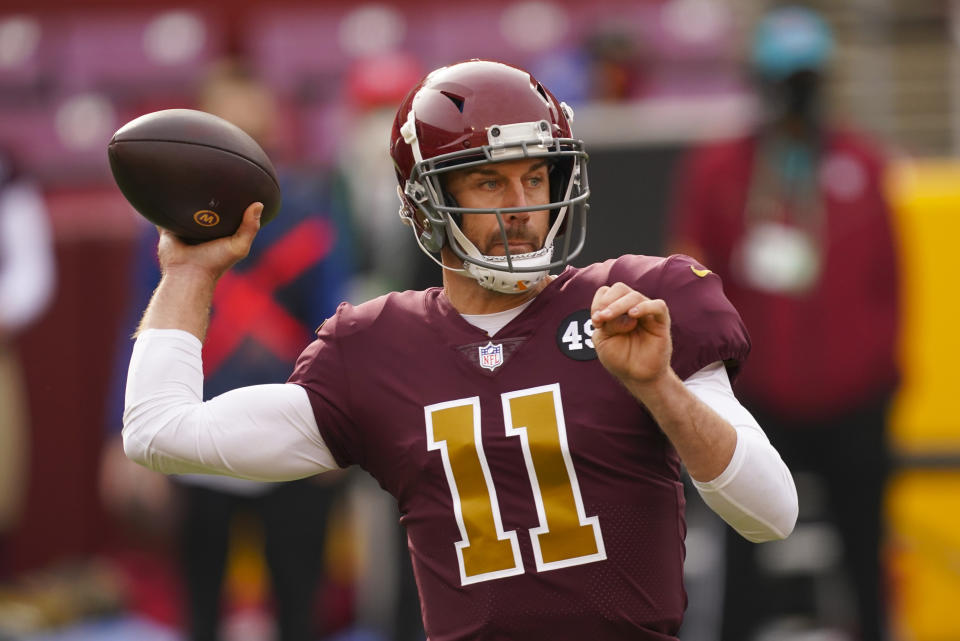 Washington Football Team quarterback Alex Smith (11) passing during the first half of an NFL football game against the Cincinnati Bengals and Washington Football Team, Sunday, Nov. 22, 2020, in Landover. (AP Photo/Andrew Harnik)