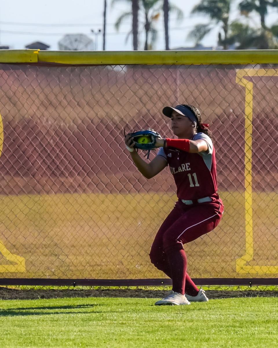 Tulare Union's Center Fielder KaiLee Gilbert huals in a fly ball against Wasco in a non-league high school softball game Wednesday, March 20, 2024 in Tulare.