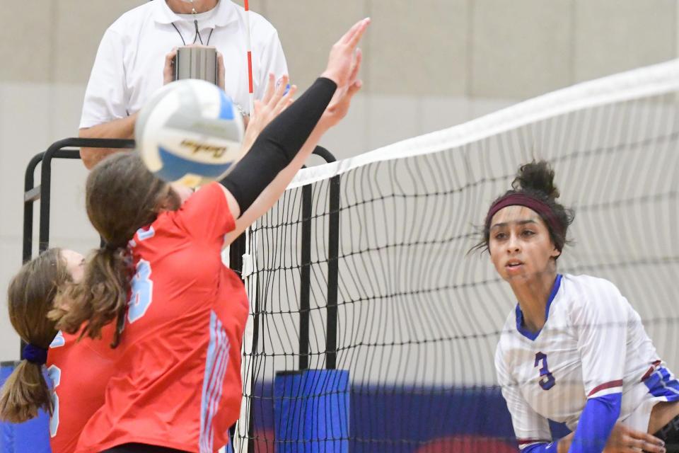 Camryn Turner competes during her high school career at Seaman, striking a ball against Shawnee Heights during a Class 5A sub-state championship game at Seaman High School.