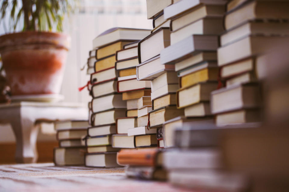 The predictability of your favourite book can help ease anxiety (Image via Getty Images). 