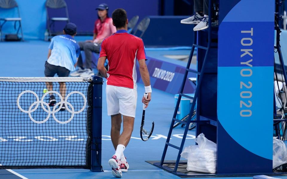 Missing: most of Djokovic's racquet - AP