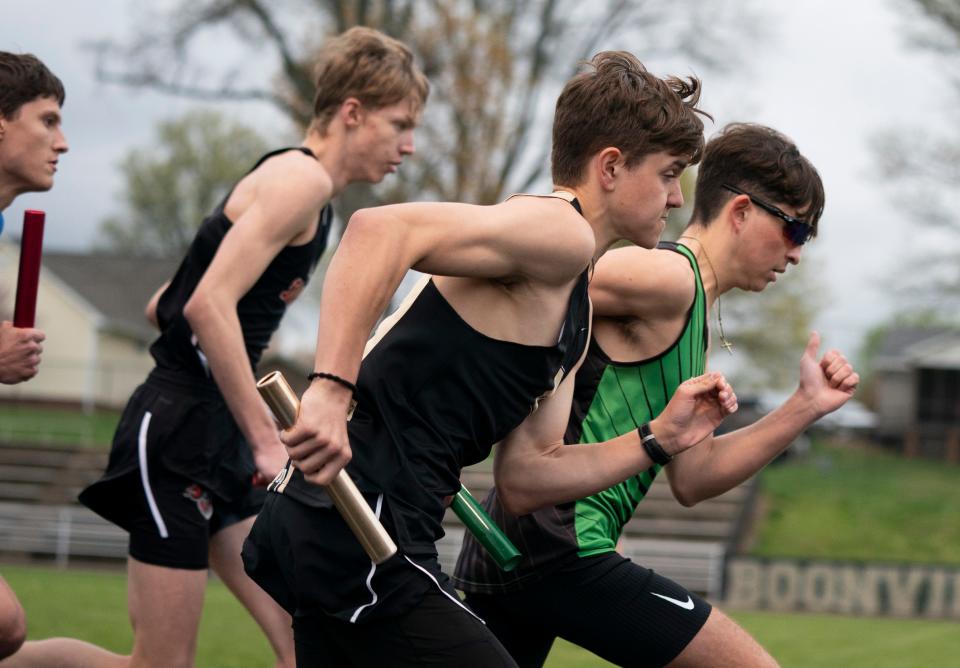 Boonville’s Eli Mayes takes off in the 4x800 meter relay during a track meet in Boonville, Ind., Tuesday, April 9, 2024.