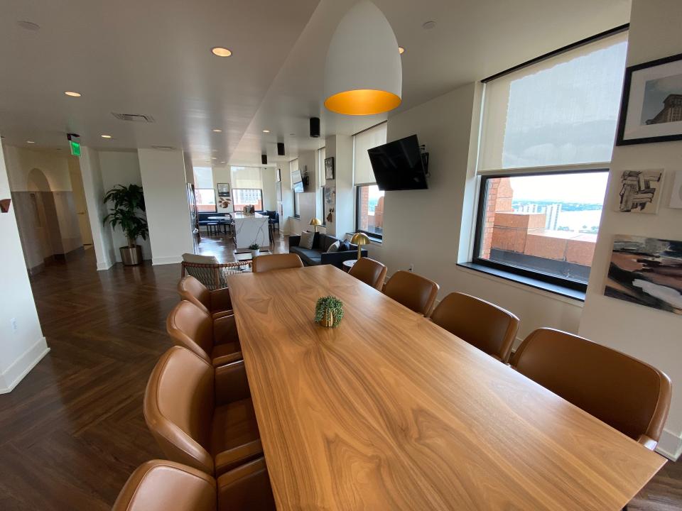 The communal space in the David Scott Building filled with chairs and a table