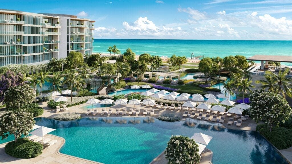 Cool off at the beach or pools at the St. Regis Longboat Key Resort.