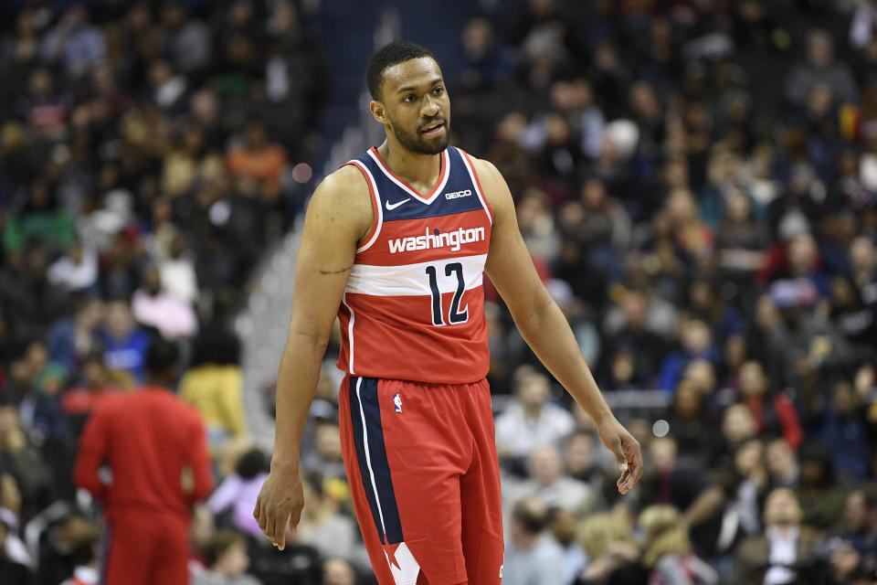 Washington Wizards forward Jabari Parker (12) stands on the court during the second half of an NBA basketball game against the Cleveland Cavaliers, Friday, Feb. 8, 2019, in Washington. The Wizards won 119-106. (AP Photo/Nick Wass)