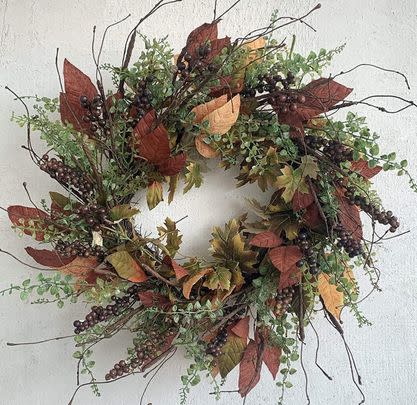 A burgundy wreath that'll look berry lovely on your door