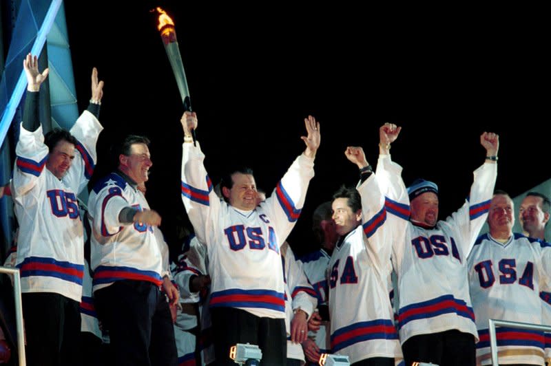Captain Mike Eruzione of the 1980 U.S. Olympic hockey team celebrates with his teammates after lighting the Olympic cauldron during the opening ceremonies of the 2002 Olympic Winter Games in Salt Lake City on February 8, 2002. On February 22, 1980, in one of the most dramatic upsets in Olympics history, the underdog U.S. hockey team, made up of collegians and second-tier professional players, defeated the defending champion Soviet team, regarded as the world's finest, 4-3, at the Winter Games in Lake Placid, N.Y. File Photo by H. Ruckemann/UPI