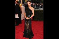 Dark and brooding, Rooney Mara opts for a mix of lace and leather on an asymmetrical silhouette. <br><i>Photo from Getty Images.</i>