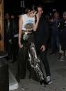 <p>We were all inspired when Kendall paired a vintage tee with a glitzy metallic skirt. [Photo: Getty] </p>