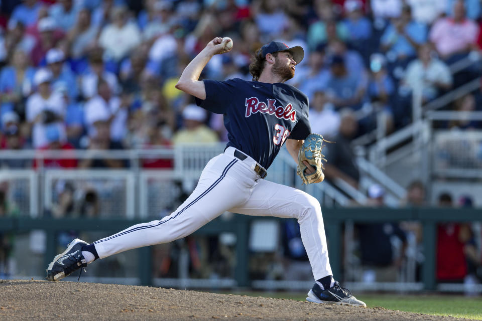 Mississippi starting pitcher Jack Dougherty throws against Oklahoma in the third inning during the first championship baseball game of the NCAA College World Series Saturday, June 25, 2022, in Omaha, Neb. (AP Photo/John Peterson)