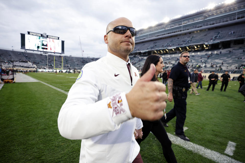 Minnesota coach P.J. Fleck walks off the field following an NCAA college football game against Michigan State, Saturday, Sept. 24, 2022, in East Lansing, Mich. Minnesota won 34-7. (AP Photo/Al Goldis)