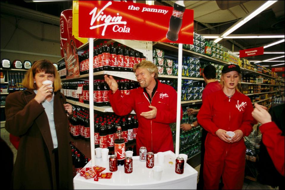 FRANCE - MARCH 01:  Richard Branson at Launching of Virgin Cola in Paris, France in March, 1998 - At Bagnolet Auchan supermarket.  (Photo by Thierry BOCCON-GIBOD/Gamma-Rapho via Getty Images)