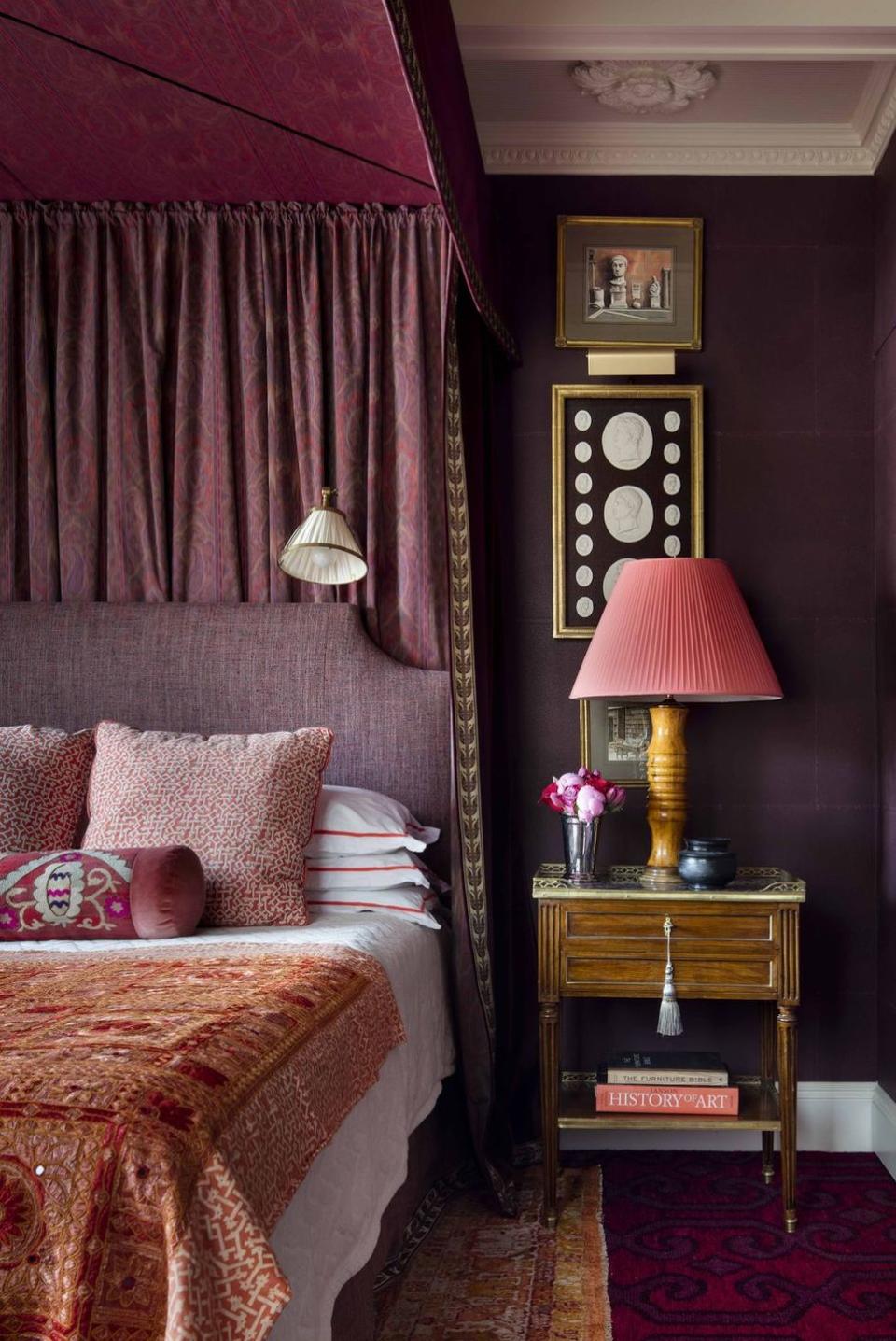 <p>Balance the moody feel from the eggplant walls with bursts of brightness from light-colored pillow covers, throw blankets, and lampshades. </p><p><em><a href="https://www.elledecor.com/design-decorate/room-ideas/g21639359/purple-bedrooms/" rel="nofollow noopener" target="_blank" data-ylk="slk:See more at Elle Decor »;elm:context_link;itc:0;sec:content-canvas" class="link ">See more at Elle Decor »</a></em><br></p>