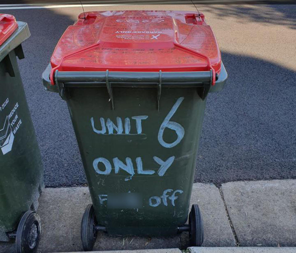 A Sydney resident, believed to be in Auburn, has graffitied their own rubbish bin to deter neighbours and others from using it.