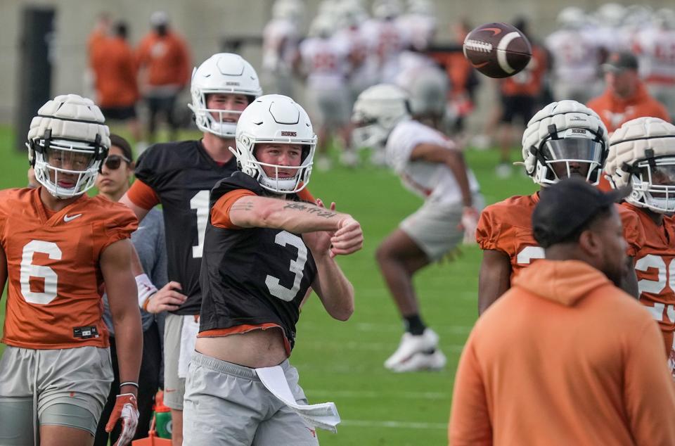 Texas quarterback Quinn Ewers throws a pass during the Longhorns' first spring practice last Tuesday. He's entering his third season as Texas' starter.