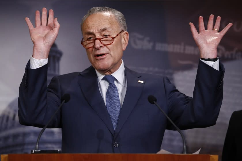 Senate minority leader, Charles Schumer, D-NY., gestures during a news conference in the Senate media room at the Capitol Tuesday, Jan. 21, 2020, in Washington. (AP Photo/Steve Helber)