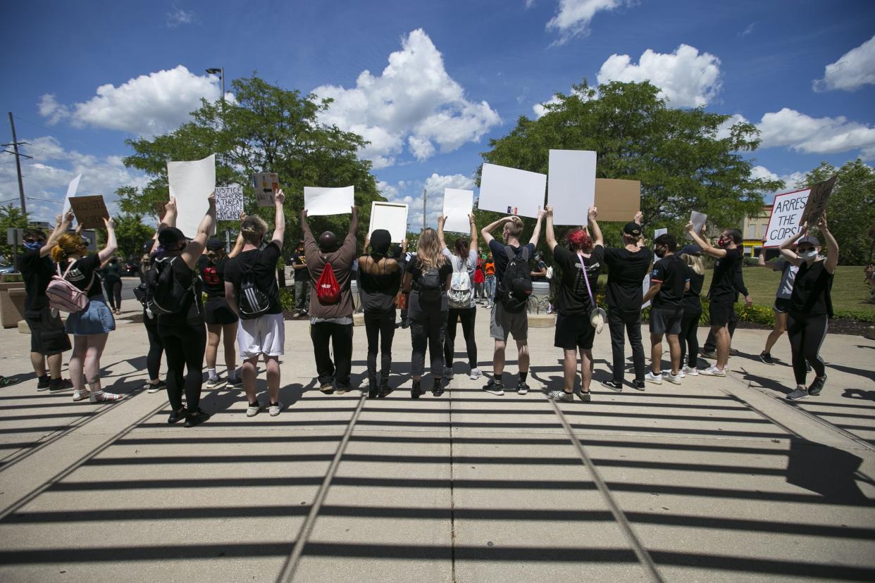 Rockford Youth Activism protesters march around the Winnebago County Justice Center on Thursday, June 25, 2020, in Rockford.