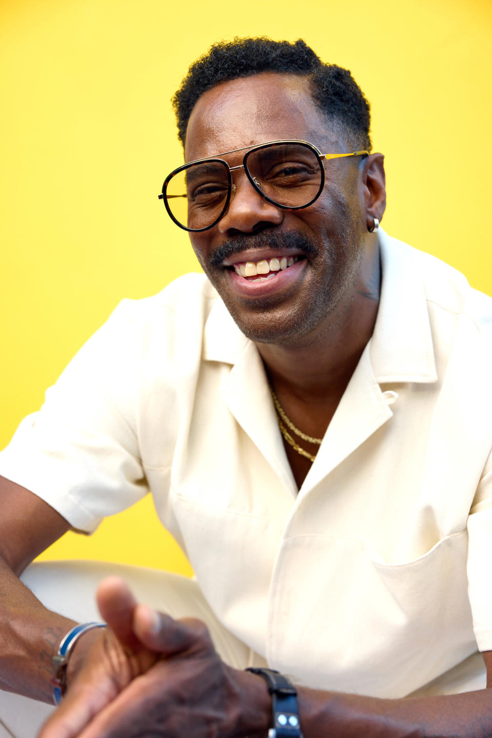 Colman Domingo smiles in the IMDb Portrait Studio at the 2022 Outfest LA LGBTQ+ Film Festival opening night