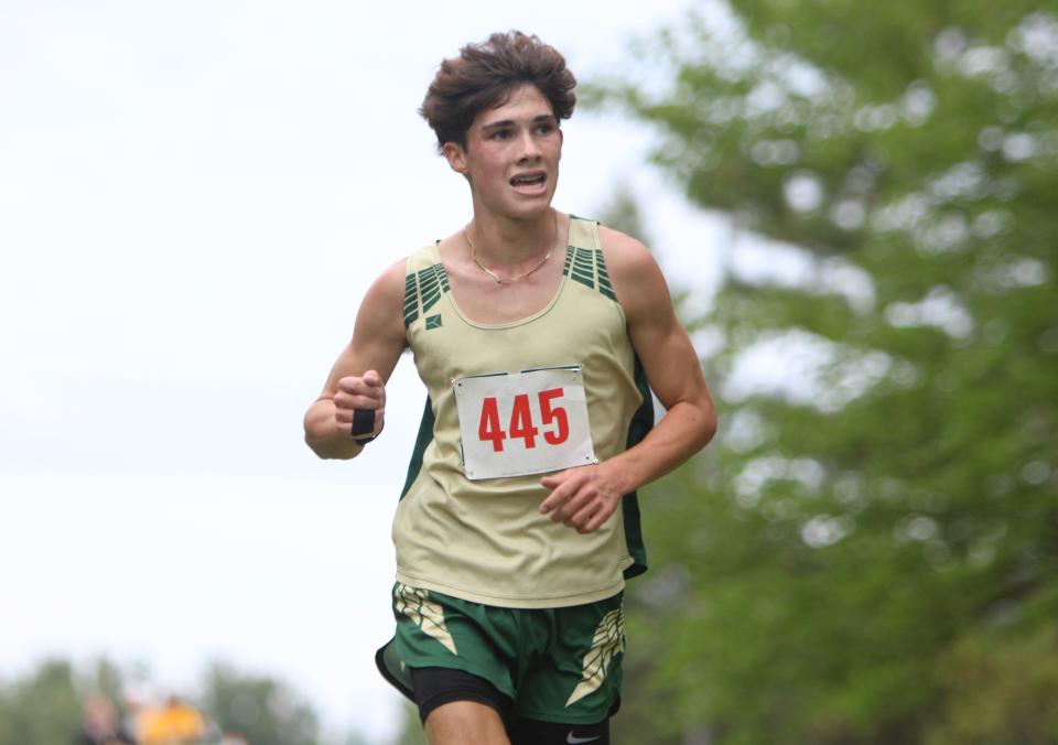 Howell's Jack MacGregor became only the second Livingston County freshman to break 16 minutes in a cross country meet against Canton and Novi Tuesday, Sept. 19, 2023 at Howell High School.