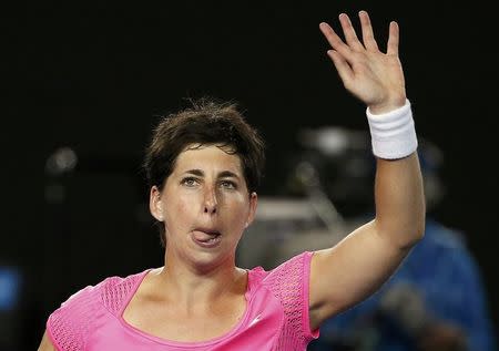 Spain's Carla Suarez Navarro celebrates after winning her fourth round match against Australia's Daria Gavrilova at the Australian Open tennis tournament at Melbourne Park, Australia, January 24, 2016. REUTERS/Issei Kato