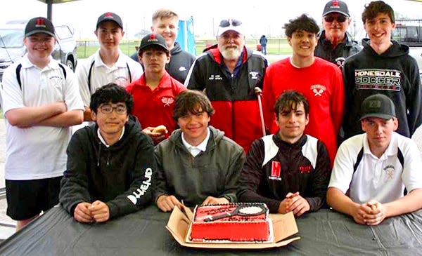 Honesdale boys tennis coach Keith Andrews celebrates Senior Day with his team. The veteran skipper has announced his retirement now that the spring season has ended.