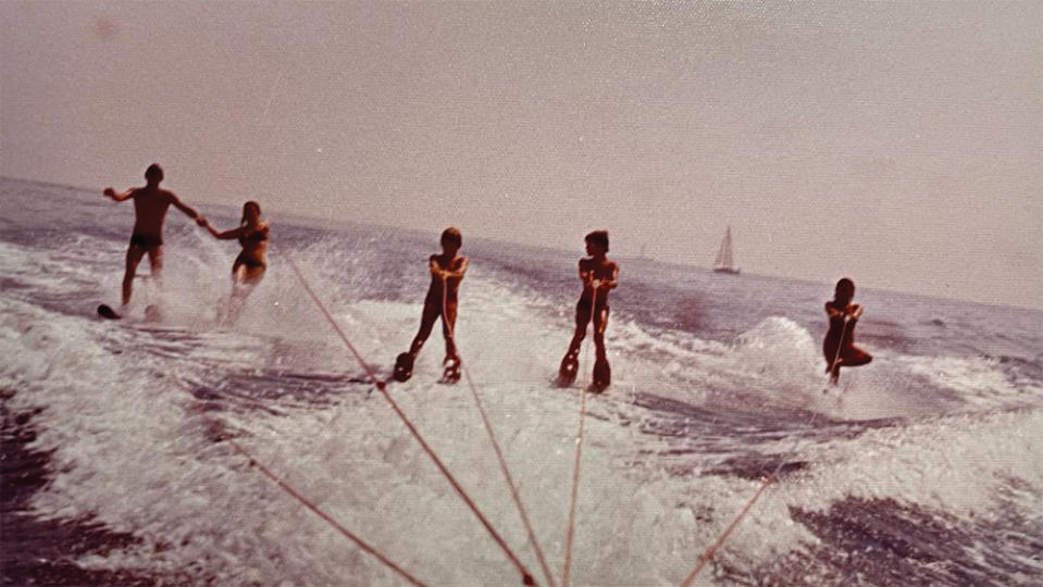 Jonathan Showering (second from right) waterskiing with four of his siblings in the late ’60s. - Credit: Courtesy of Jonathan Showering