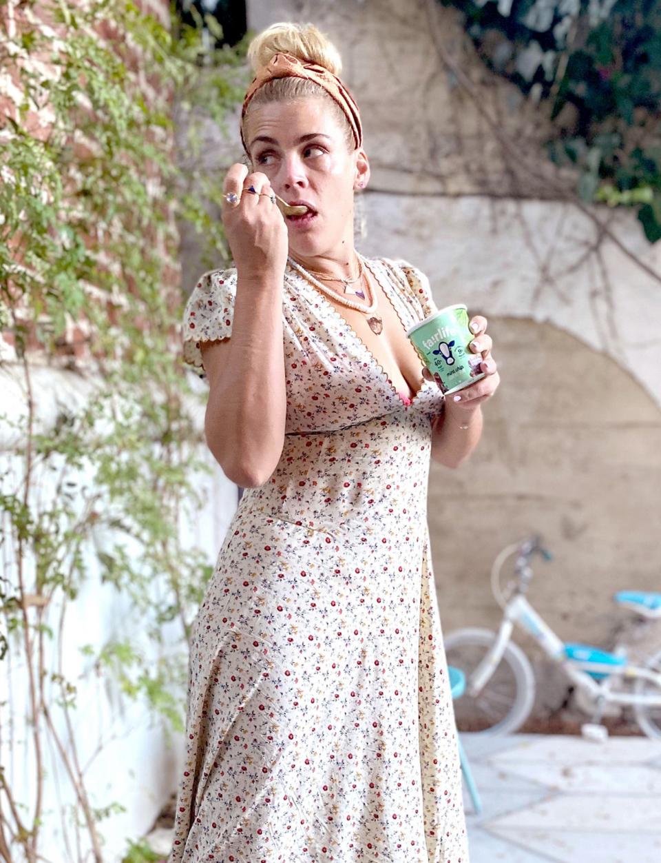 <p>Busy Philipps snacks on some Fairlife Light Ice Cream at home in Los Angeles on Tuesday. </p>