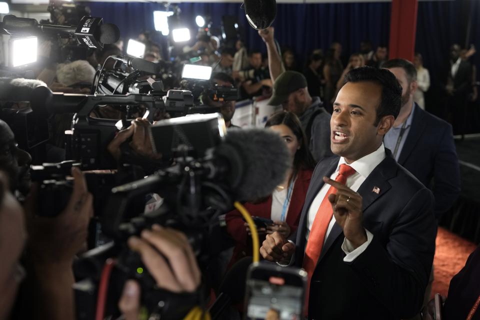Businessman Vivek Ramaswamy speaks to reporters in the spin room after a Republican presidential primary debate hosted by FOX News Channel Wednesday, Aug. 23, 2023, in Milwaukee. | Morry Gash, Associated Press
