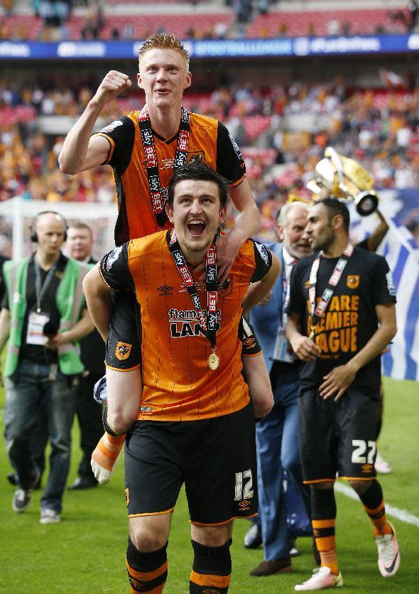 Britain Soccer Football - Hull City v Sheffield Wednesday - Sky Bet Football League Championship Play-Off Final - Wembley Stadium - 28/5/16 Hull City's Harry Maguire and Samuel Clucas celebrate after winning promotion back to the Premier League Action Images via Reuters / Andrew Couldridge Livepic EDITORIAL USE ONLY. No use with unauthorized audio, video, data, fixture lists, club/league logos or "live" services. Online in-match use limited to 45 images, no video emulation. No use in betting, games or single club/league/player publications. Please contact your account representative for further details.