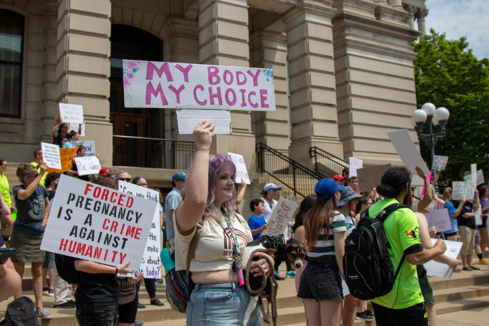 Outside of the Tippecanoe County Courthouse, protesters demonstrate as part of the nationwide "Bans Off Our Bodies" protest against the potential Supreme Court decision that would overturn Roe v. Wade, on May 14, 2022, in Lafayette.