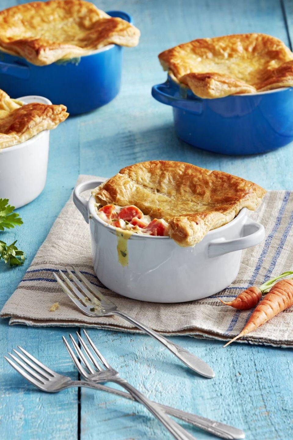 <p>Want to get a little fancier than roasted carrots? This creamy dish would make a great vegetarian entrée, but it's also a delicious side. </p><p><strong><a href="https://www.countryliving.com/food-drinks/a28609512/mini-carrot-pot-pies-recipe/" rel="nofollow noopener" target="_blank" data-ylk="slk:Get the recipe;elm:context_link;itc:0;sec:content-canvas" class="link ">Get the recipe</a>.</strong></p><p><strong><a class="link " href="https://www.amazon.com/Sweese-501-001-Porcelain-Souffle-Ramekins/dp/B0757DSVJB?tag=syn-yahoo-20&ascsubtag=%5Bartid%7C10050.g.33370793%5Bsrc%7Cyahoo-us" rel="nofollow noopener" target="_blank" data-ylk="slk:SHOP RAMEKINS;elm:context_link;itc:0;sec:content-canvas">SHOP RAMEKINS</a><br></strong></p>