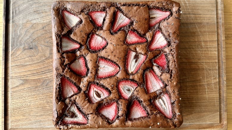 Square of brownies on cutting board