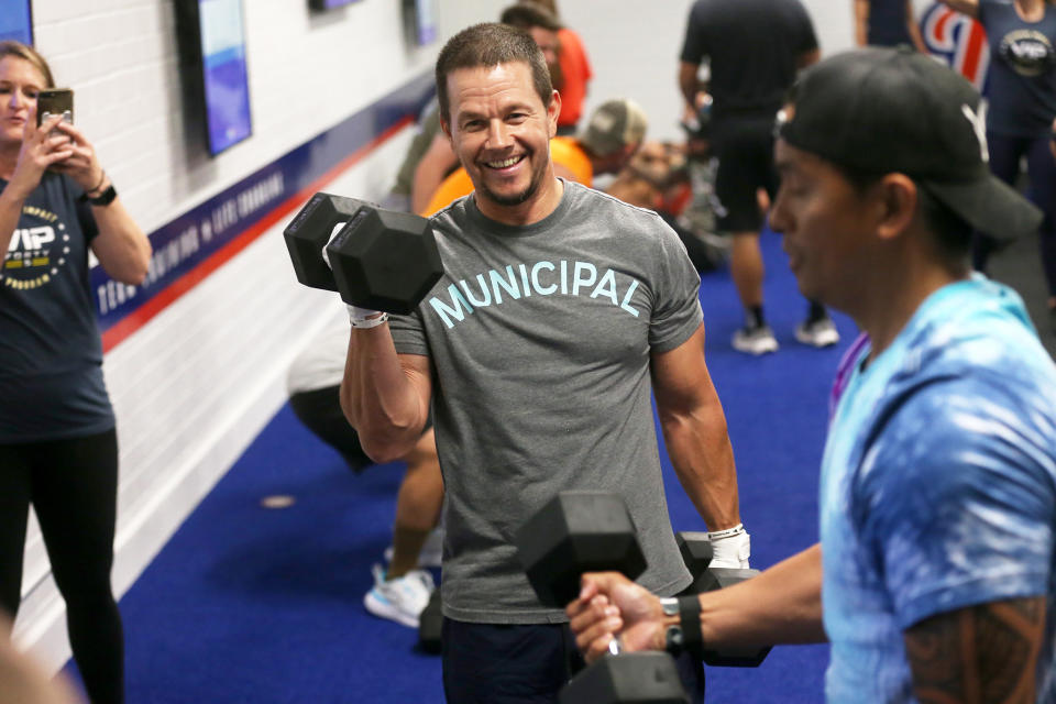 <p>Mark Wahlberg sweats it out at the opening of F45 Training at Miramar MCAs on June 11 in San Diego. </p>