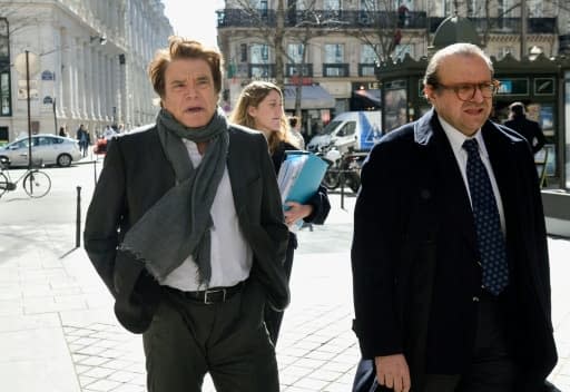 Bernard Tapie et son avocat  Hervé Temime à leur arrivée au pôle financier le 12 mars 2015 à Paris - ERIC FEFERBERG, AFP/Archives