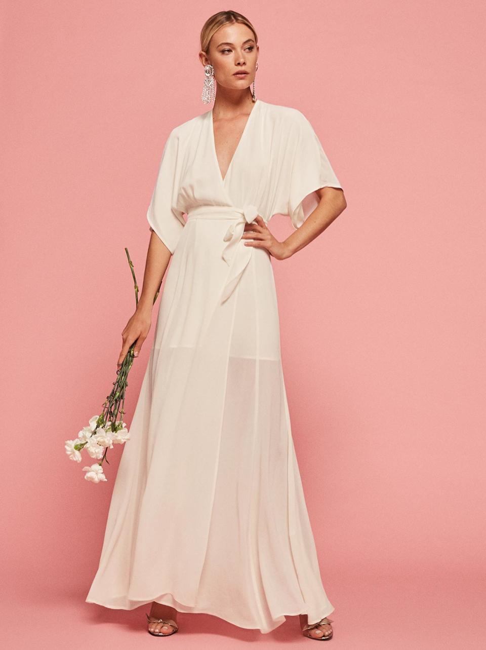 <p>The Winslow Dress, $268, <a rel="nofollow noopener" href="https://www.thereformation.com/products/winslow-dress-ivory" target="_blank" data-ylk="slk:thereformation.com;elm:context_link;itc:0;sec:content-canvas" class="link ">thereformation.com</a> </p>