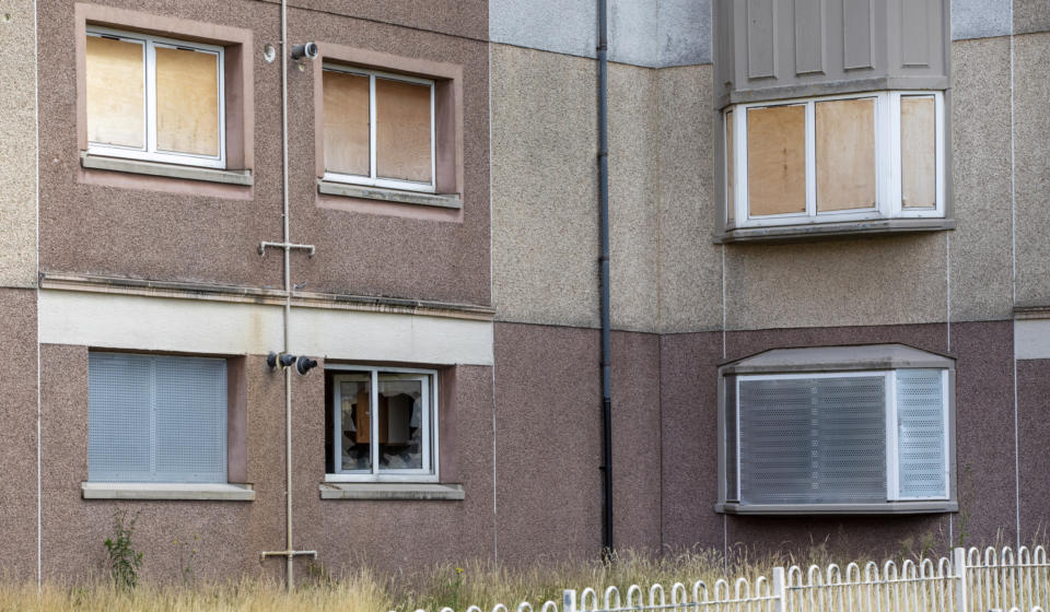 Homes are empty and boarded up after residents left Stanhope Place. (SWNS)