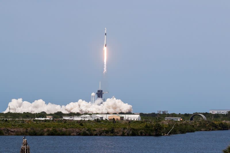 A SpaceX Falcon 9 rocket and Crew Dragon spacecraft carrying NASA astronauts Douglas Hurley and Robert Behnken lifts off during NASA's SpaceX Demo-2 mission to the International Space Station from NASA’s Kennedy Space Center in Cape Canaveral